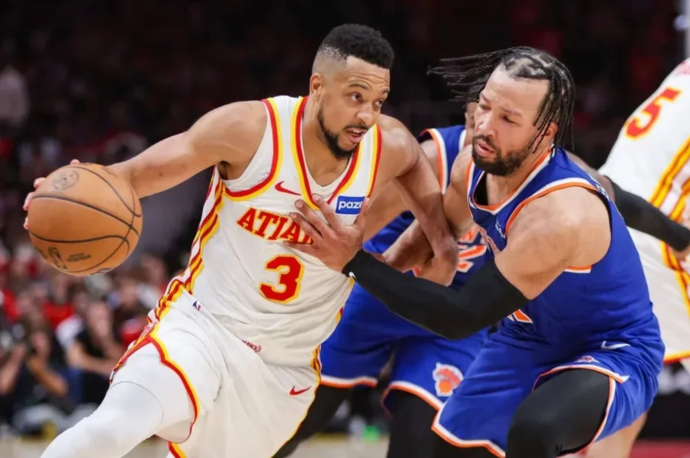 Apr 23, 2026; Atlanta, Georgia, USA; Atlanta Hawks guard CJ McCollum (3) drives on New York Knicks guard Jalen Brunson (11) in the fourth quarter during game three of the first round of the 2026 NBA Playoffs at State Farm Arena. Mandatory Credit: Brett Davis-Imagn Images