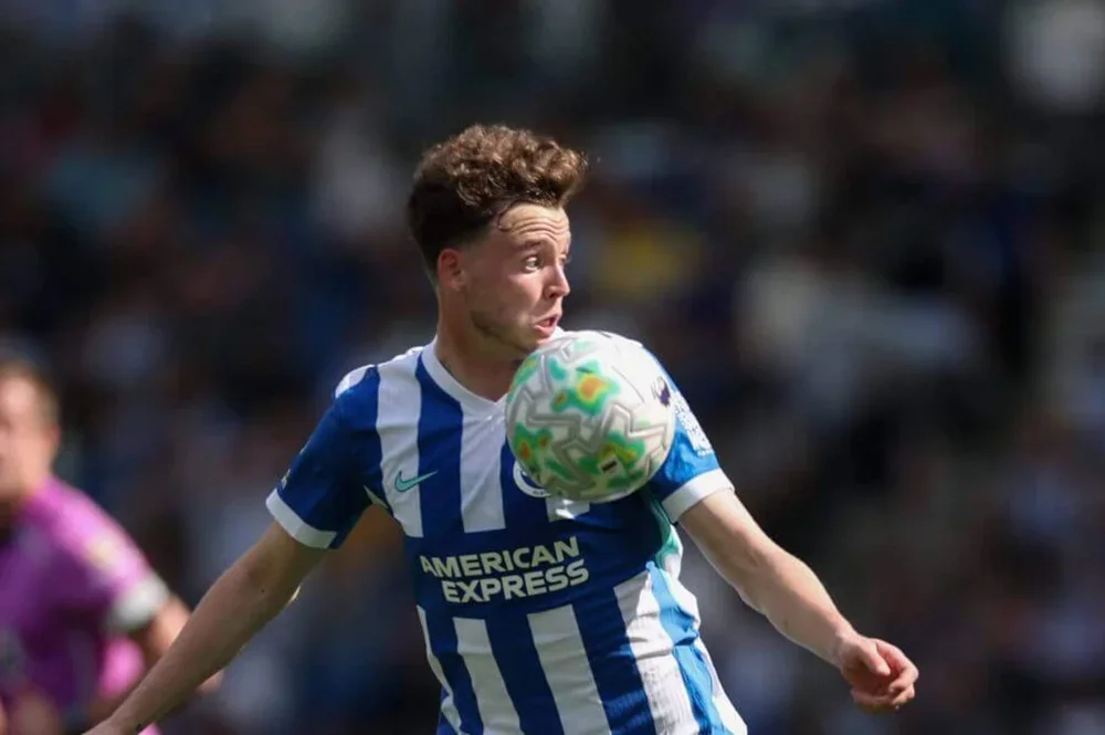 Brighton's Maxim De Cuyper controls the ball with his chest